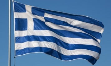 Дефолт по внешнему долгу в интересах Греции - эксперт