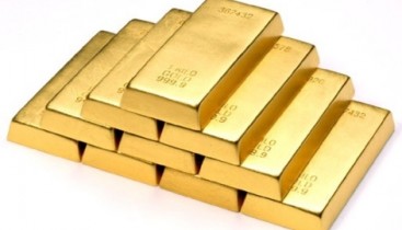 Цены на золото растут благодаря снижению доллара