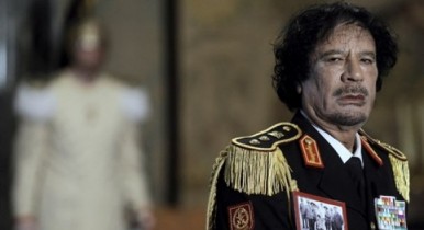 Каддафи откроет банк в России