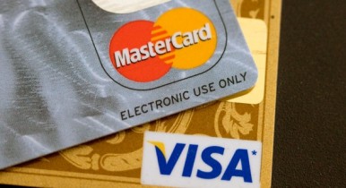 Visa и MasterCard поплатились за сговор.