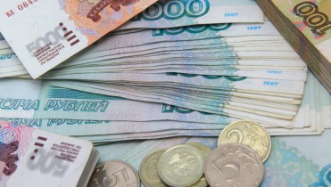 Рубль снова обновил минимумы по отношению к евро и доллару