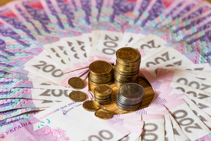 Национальный банк повысил официальный курс гривны на 2 копейки до 25,09 грн/$.