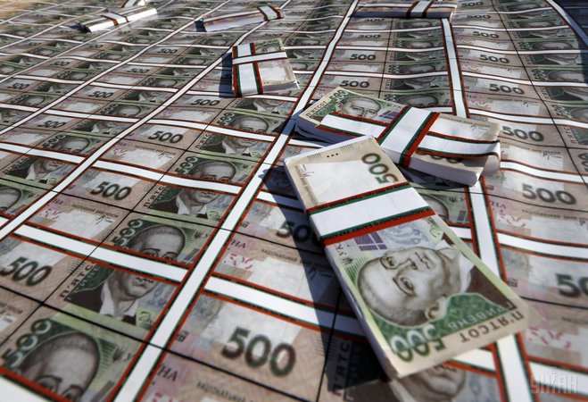 Национальный банк повысил официальный курс гривны на 5 копеек до 25,09 грн/$.