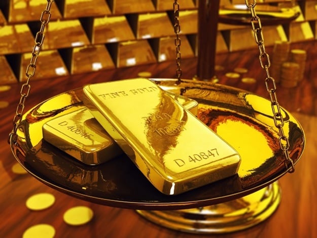 Национальны банк понизил курс золота и серебра.