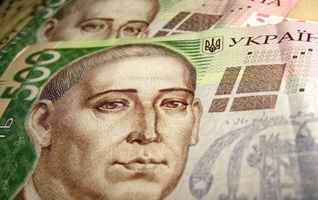 Национальный банк понизил официальный курс гривны до 26,30 грн/$.