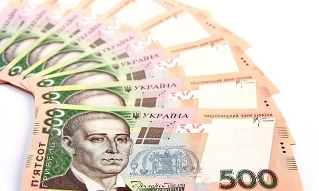 Национальный банк понизил официальный курс гривны до 26,33 грн/$.