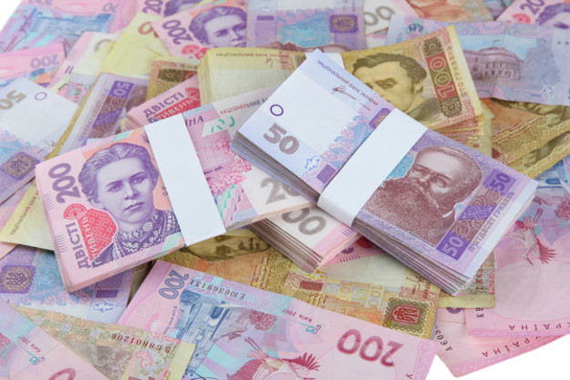 Национальный банк понизил официальный курс гривны на 5 копеек до 27,02/$.