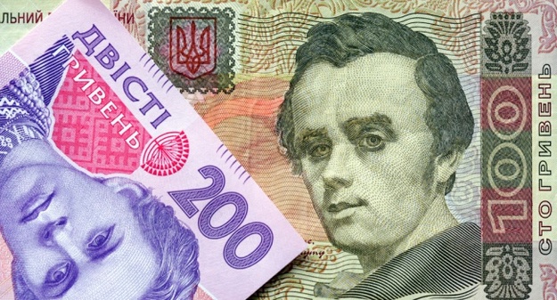 Национальный банк повысил официальный курс гривны на 1 копейку до 26,00/$.