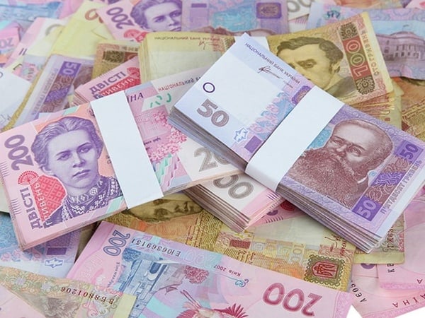 Национальный банк понизил официальный курс гривны на 1 копейку до 26,03/$.