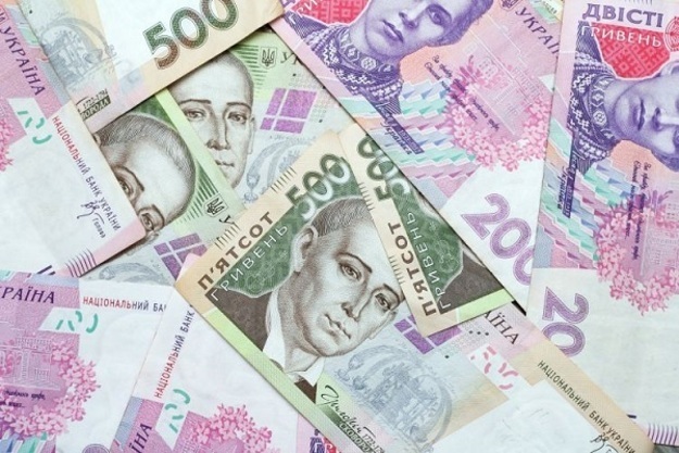 Национальный банк понизил официальный курс гривны на 2 копейки до 25,84/$.
