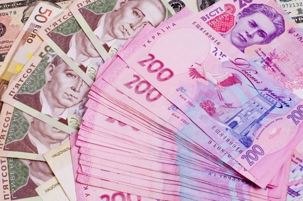 Национальный банк понизил официальный курс гривны на 1 копейку до 25,45/$.