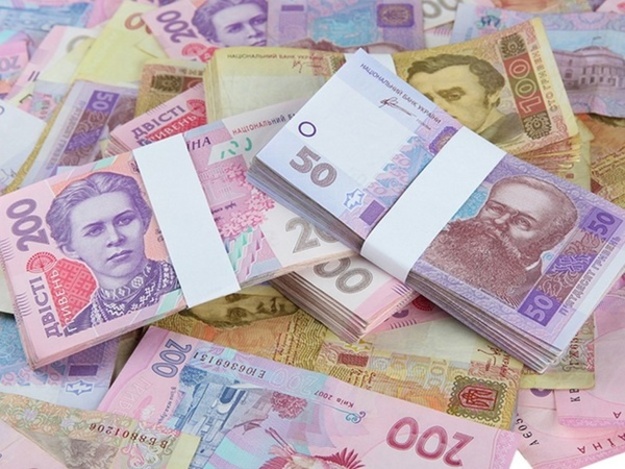 Национальный банк понизил официальный курс гривны на 5 копеек до 26,23/$.
