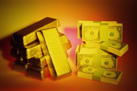 Золото вместо доллара: насколько выгодно покупать слитки?