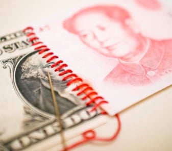 Китай отказался отвязывать юань от доллара