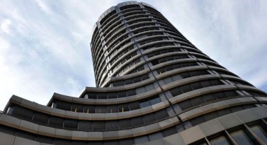 Здание Базельского комитета, крупнейшим банкам мира необходимо заработать 354 миллиарда евро.