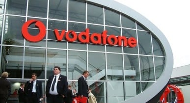 Чистая прибыль британского оператора сотовой связи Vodafone, Vodafone.