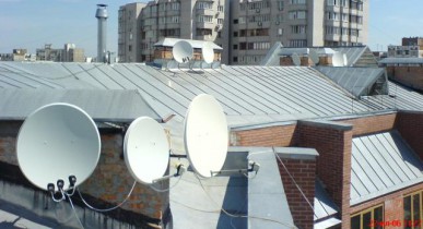 Депутаты предложили запретить установление спутниковых тарелок на жилых домах.