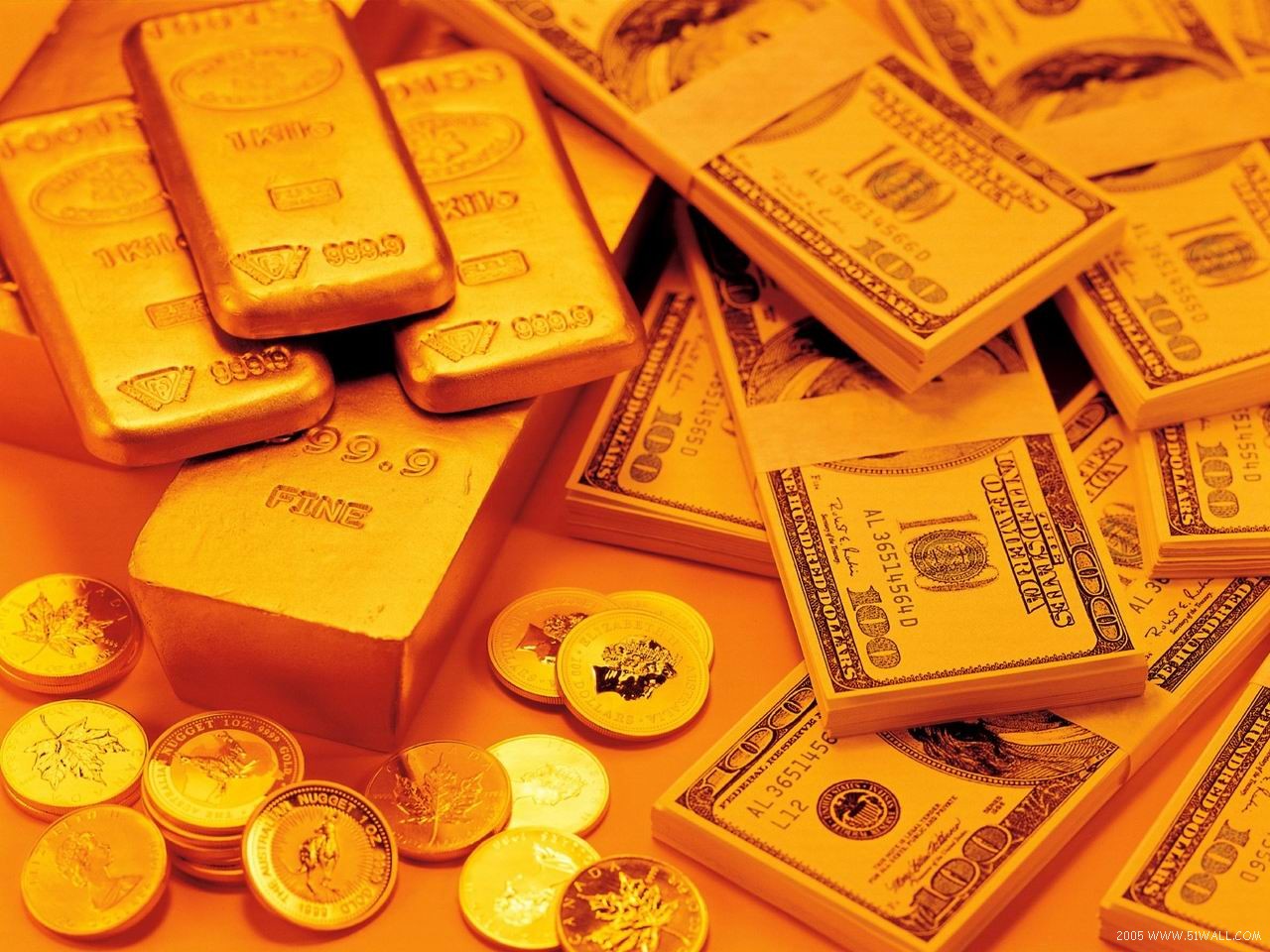 Цены на золото растут благодаря снижению курса доллара