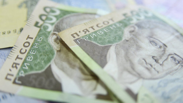 Національний банк знизив офіційний курс гривні на 10 копійок до 26,80/$.
