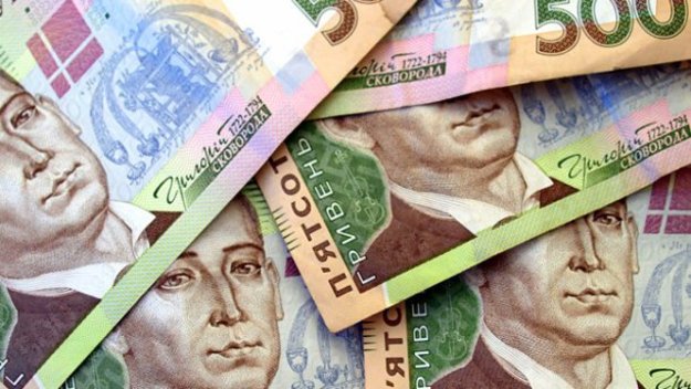 Національний банк підвищив офіційний курс гривні на 1 копійку до 26,79/$.
