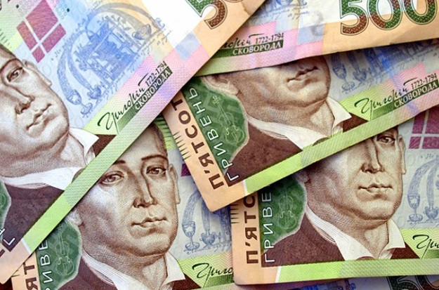 Национальный банк понизил официальный курс гривны на 3 копейки до 26,96/$.