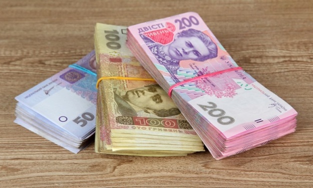 Національний банк знизив офіційний курс гривні на 9 копійок до 28,53 грн/$.