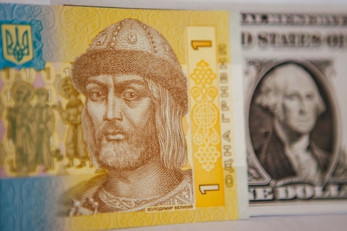 Национальный банк повысил официальный курс гривны на 14 копеек до 26,16 грн/$.