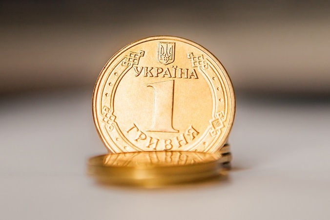 Національний банк підвищив офіційний курс гривні на 2 копійки до 27,91 гривень за долар.