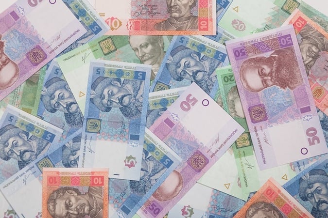 Национальный банк установил на 15 октября 2019 официальный курс гривны на уровне  24,538 грн/$.