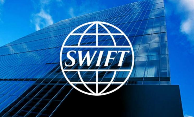 Індійські компанії використовують глобальну платіжну систему SWIFT для розрахунків у доларах з Росією попри те, що багато російських банків заблоковано в системі через санкції Заходу.