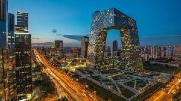 Пекин смягчает правила покупки недвижимости