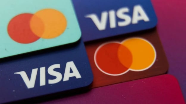 Консорціум за участю Visa, Mastercard та Coinbase запустив новий спільний стейблкоїн у рамках ініціативи щодо розширення застосування цифрових токенів, повідомляє Reuters.► Читайте телеграм-канал «Мінфіну»: головні фінансові новиниЩо відомо про проектПроект отримав назву Open Standard та об'єднує понад 140 компаній — учасників мережі.